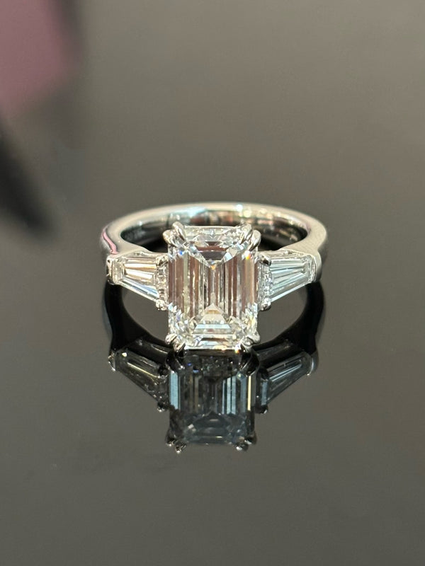 Emerald Cut Diamond Ring | IGI Certified, E Color, VS Clarity, Three-Stone Setting with Tapered Baguette Side Stones  3-Carat
