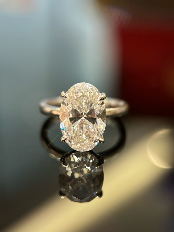 Timeless & Elegant 5Ct Oval Diamond Ring with Side Stones